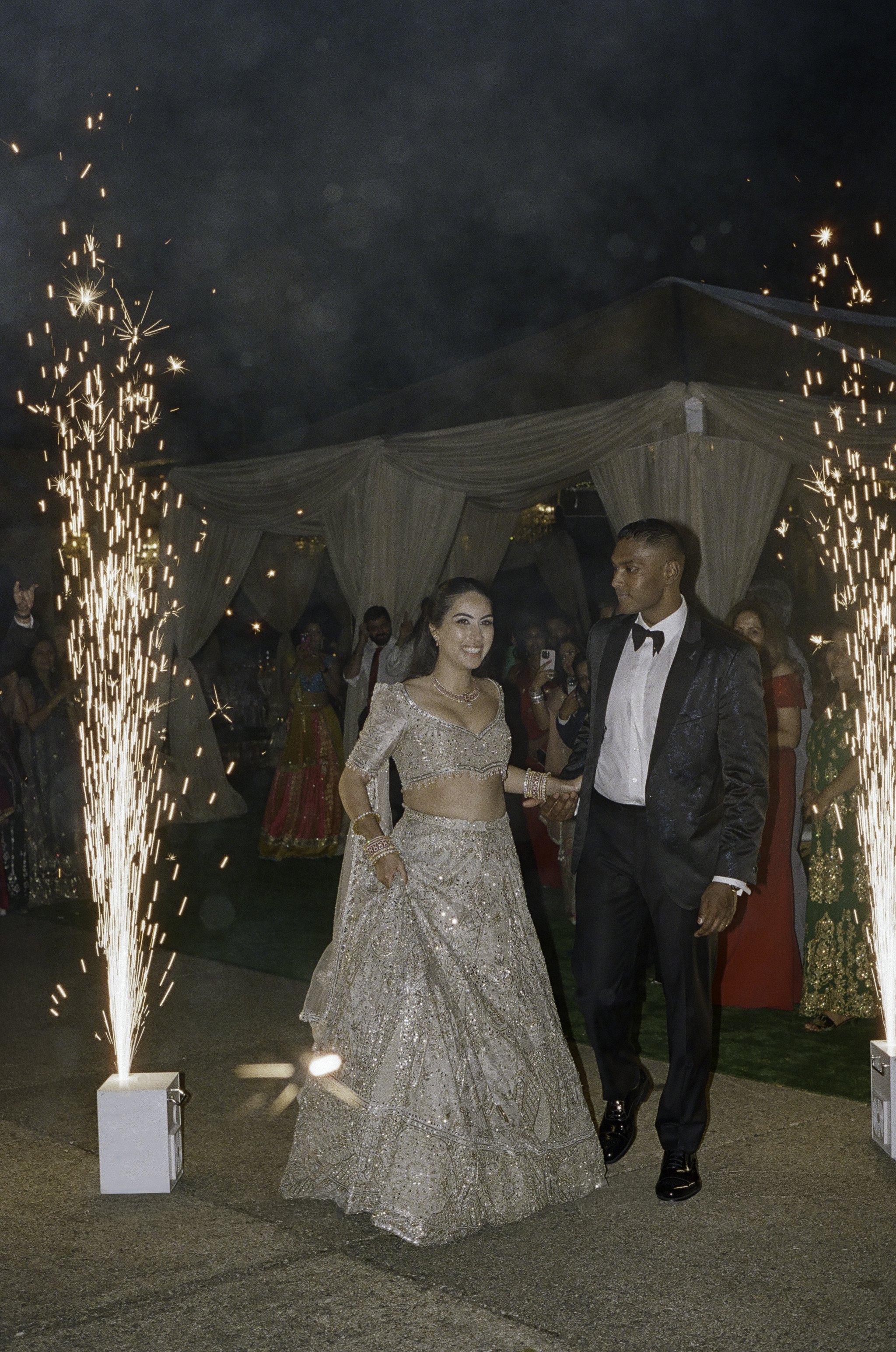 Documentary sparkler exit at Santa Barbara wedding reception — film photography by Radostina Boseva