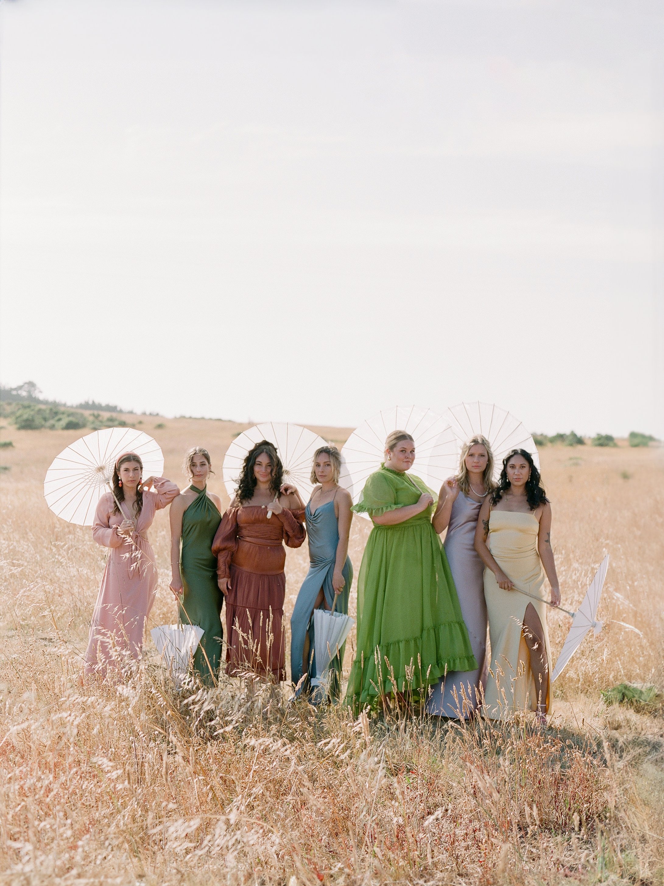 Bridesmaids in a golden field at an outdoor wedding — film wedding photography, Los Angeles