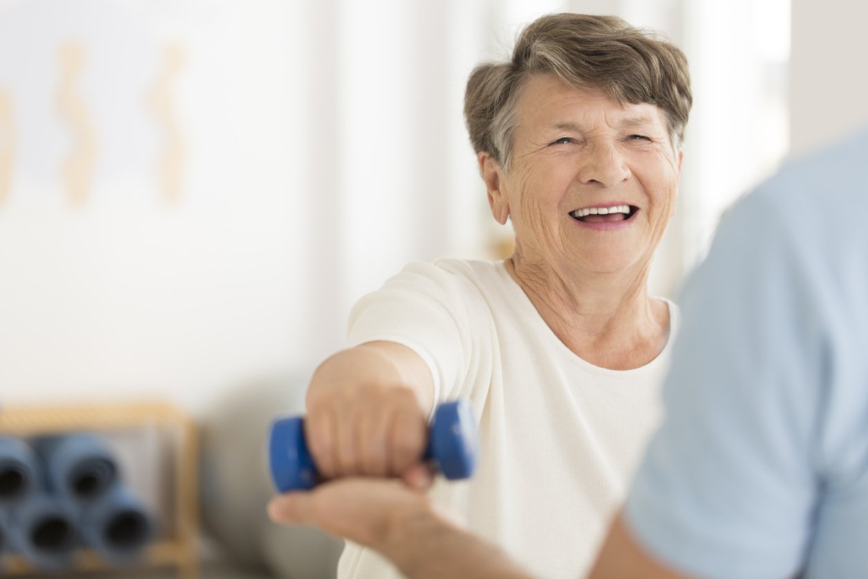 A Senior exercising in a physiotherapy class