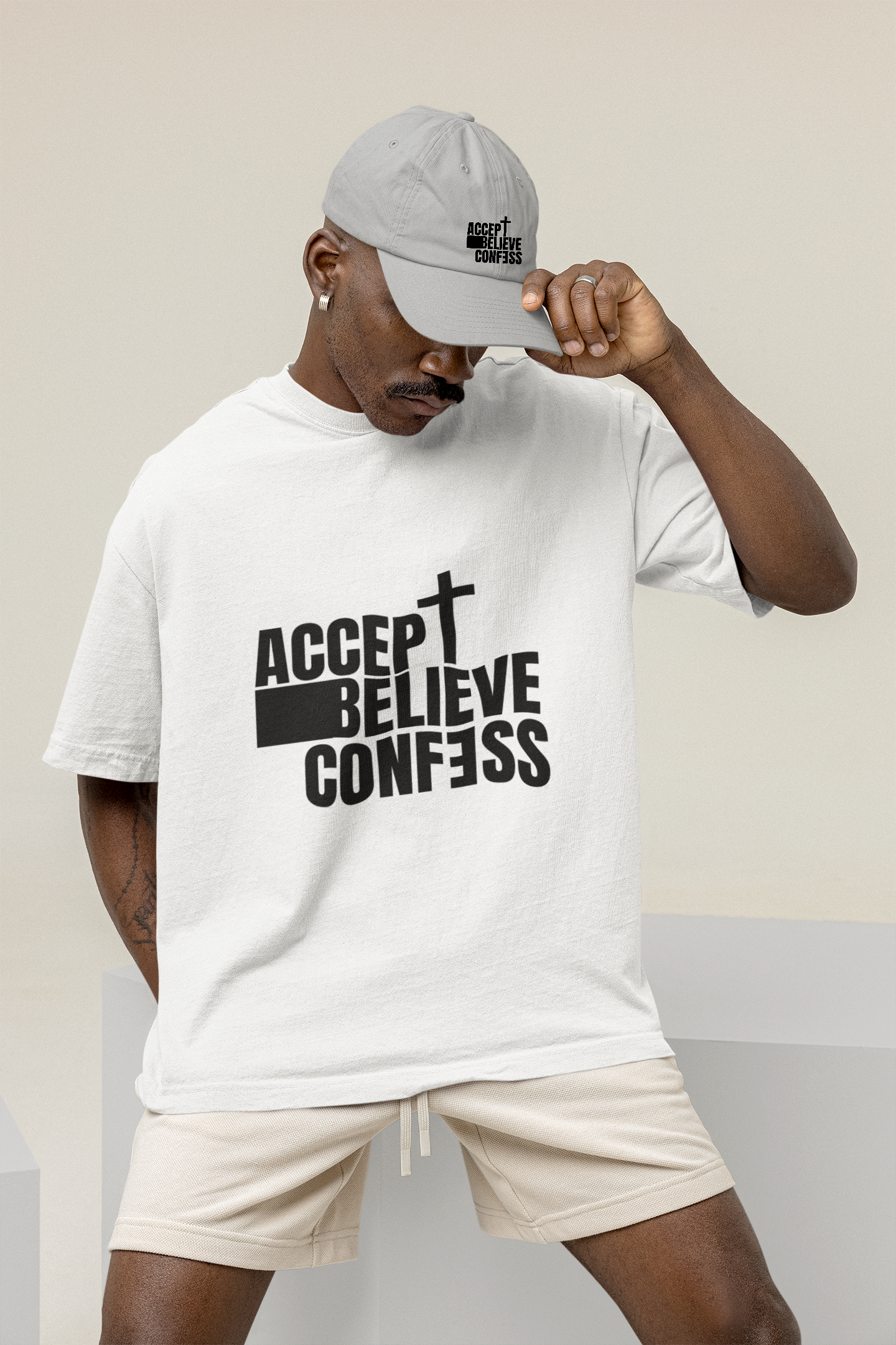 mockup-of-a-man-wearing-a-wide-t-shirt-at-a-studio-m26233.png