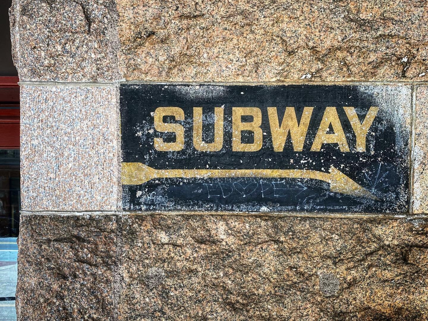 Old painted sign for the subway outside the Reading Terminal Headhouse, now the entrance to the Convention Center in Philadelphia, PA. #phillytype