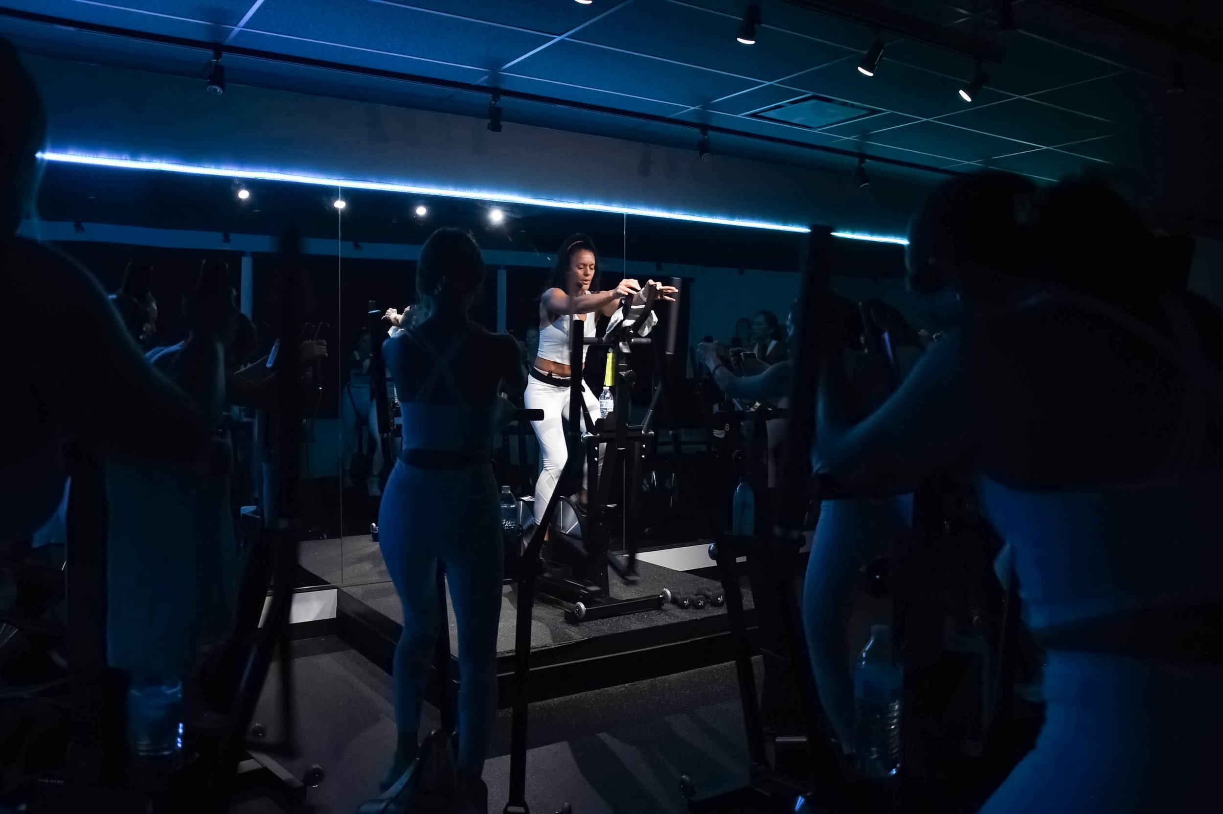 Fitness coach, elliptical machine personalized workouts, on-demand workouts, live and on-demand, Westport, Connecticut, virtual fitness classes, personalized training plans, fitness community, holistic health approach