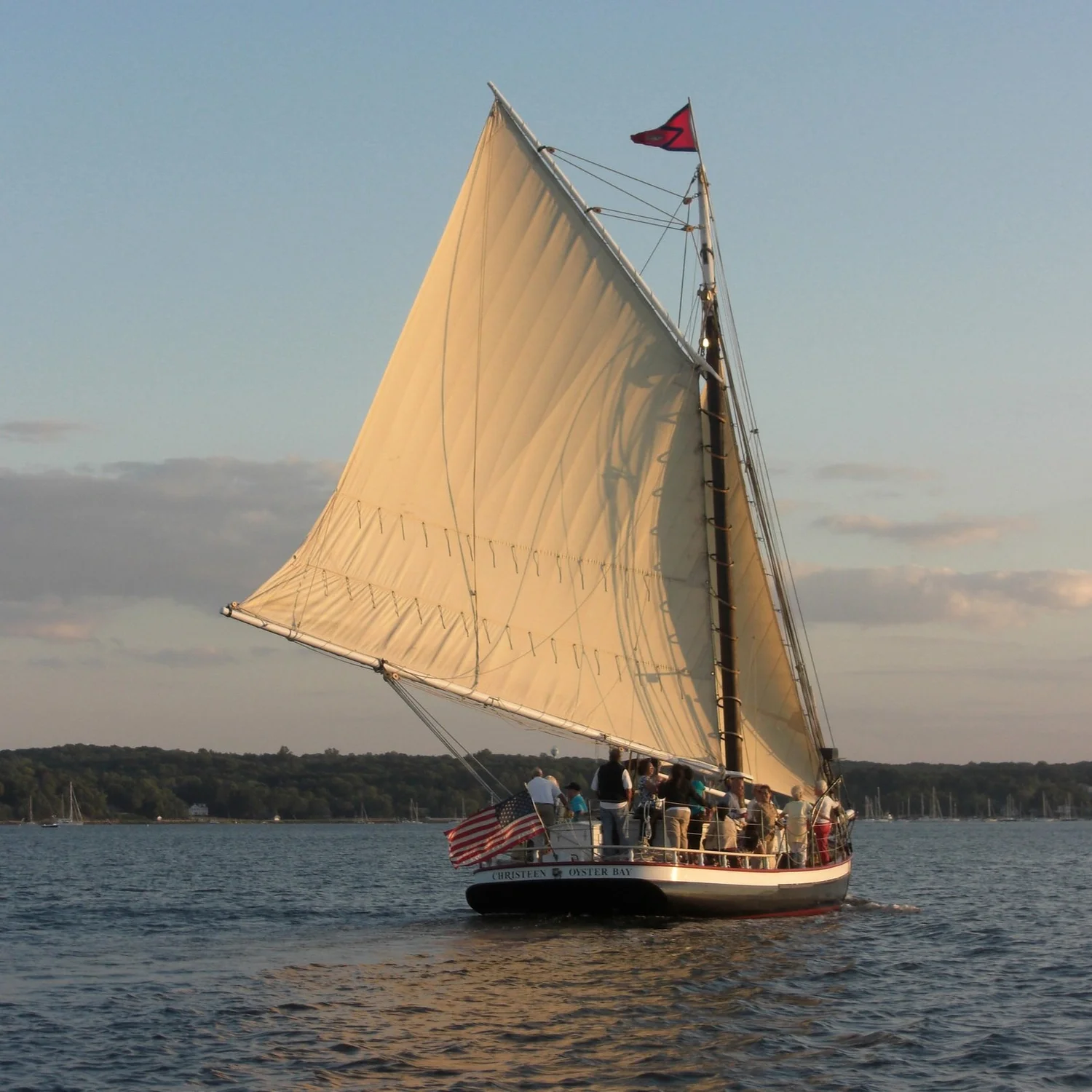CHRISTEEN sailing across Oyster Bay at sunset