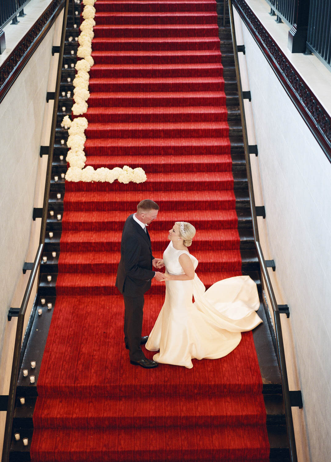 Red staircase at sagamore pendry hotel Baltimore Wedding