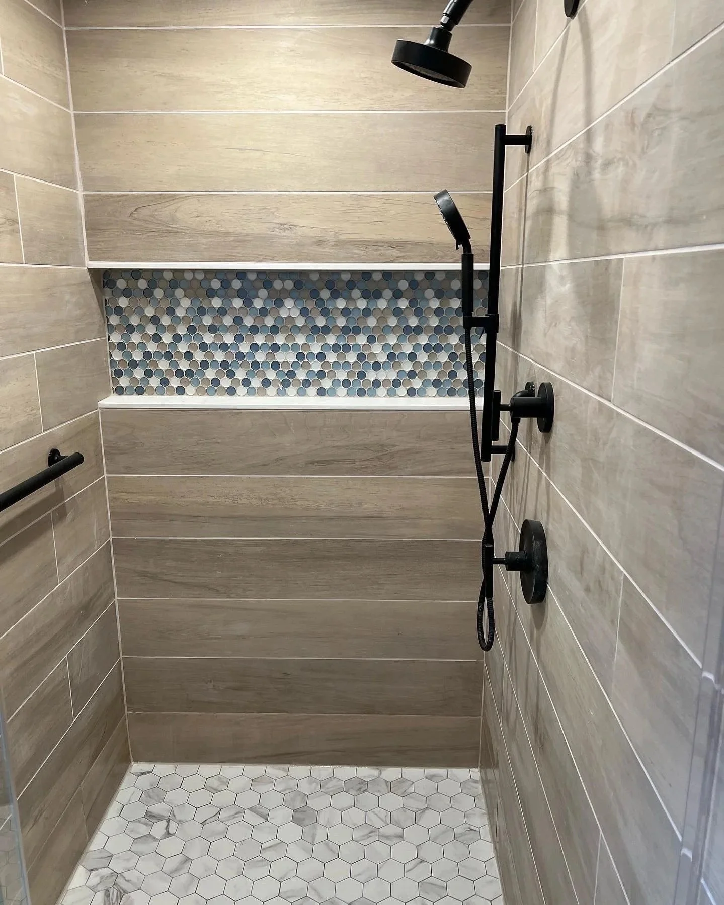 Stall shower with pebble niche in New Canaan, CT