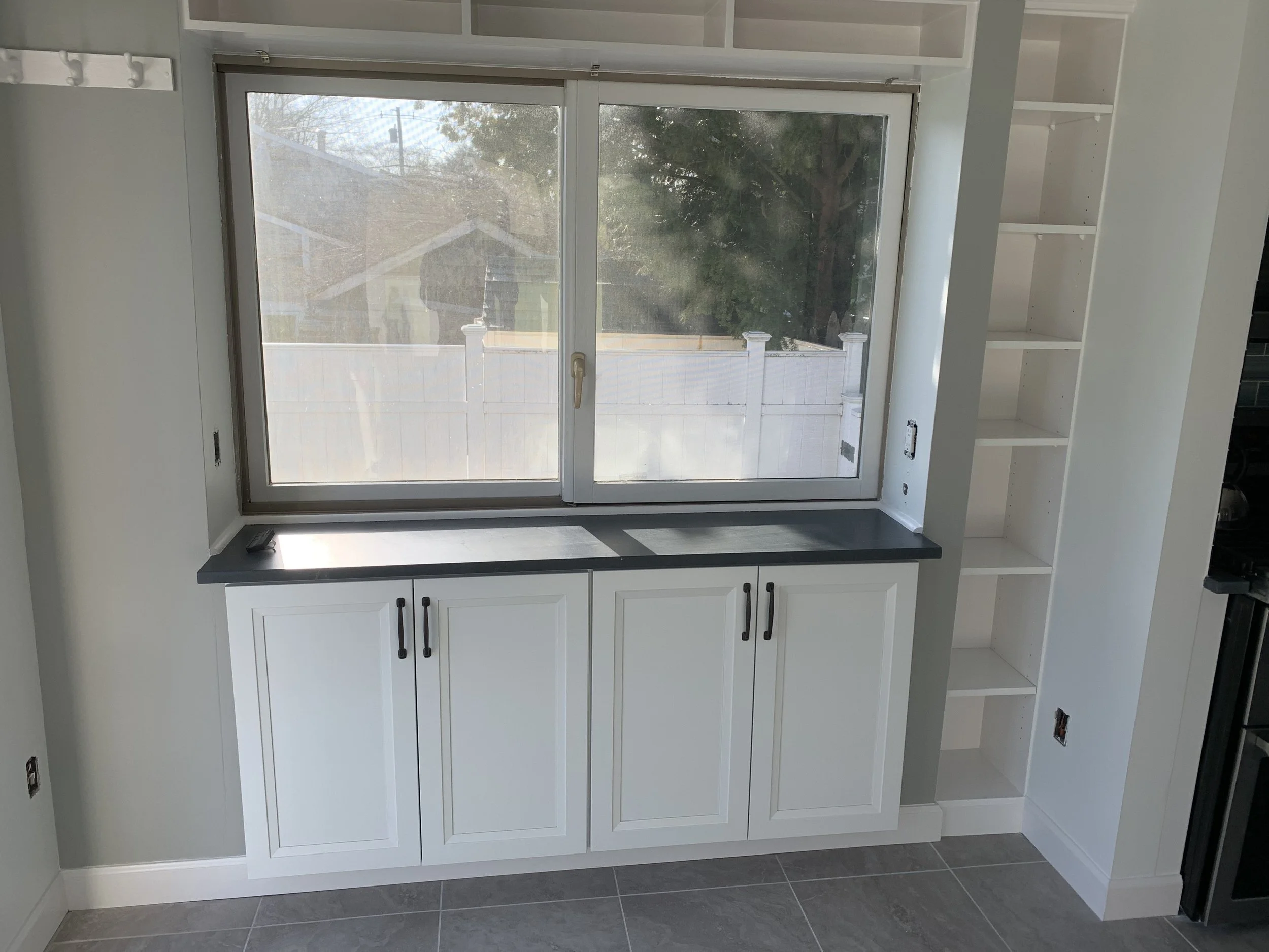 Additional storage under the window in Norwalk, CT.