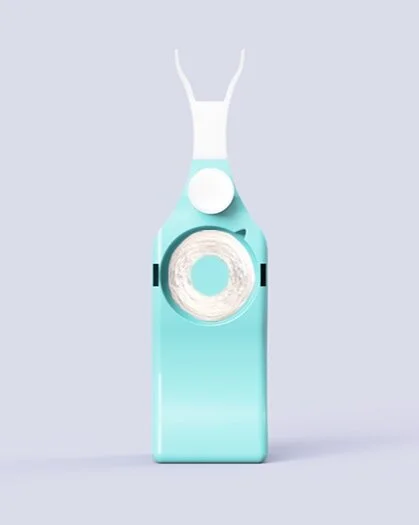 Floss housing was moved to the center to improve grip.