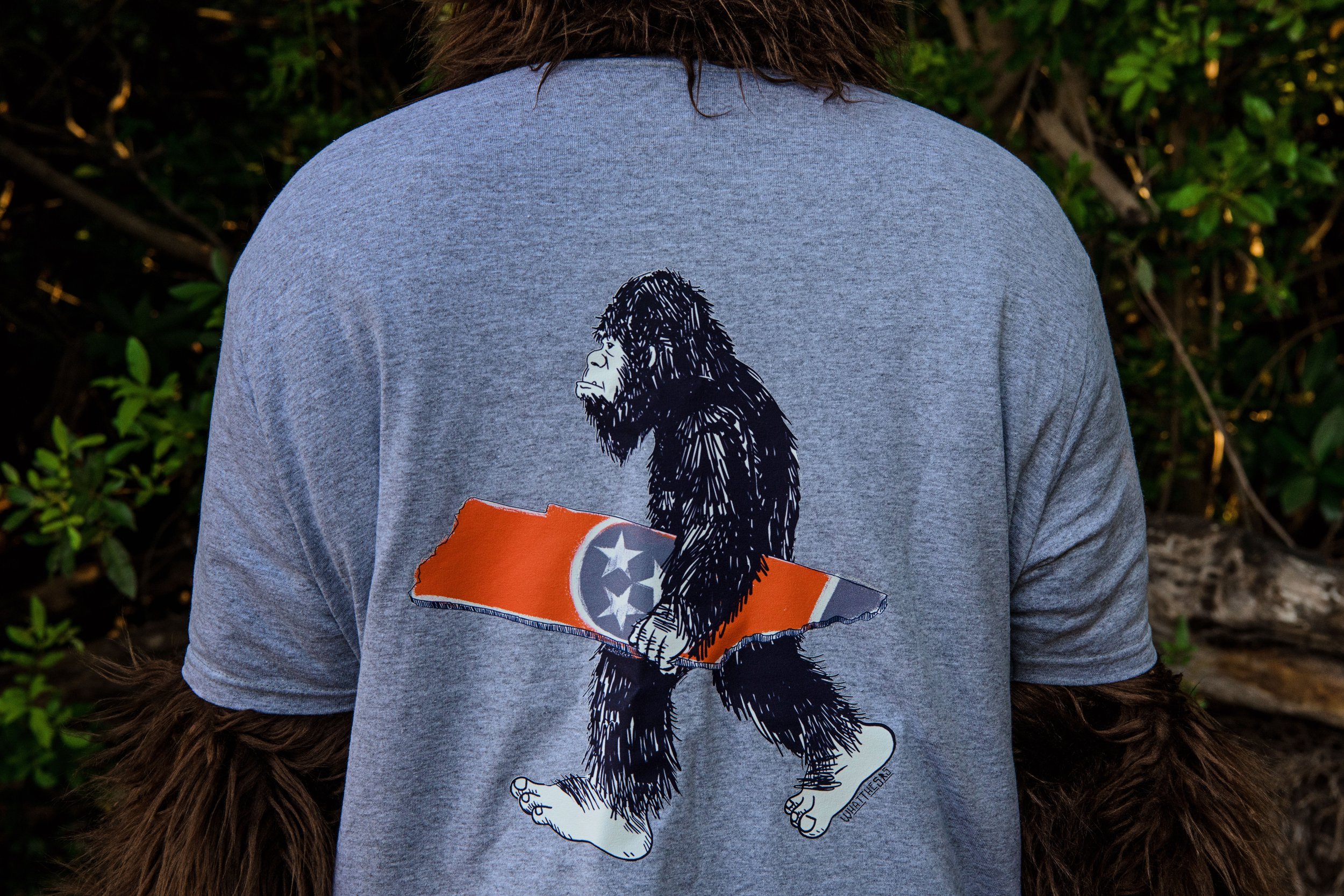 Introducing the Ultimate Tennessee Pride: The Sasquatch Carrying Orange Tri-Star Tee