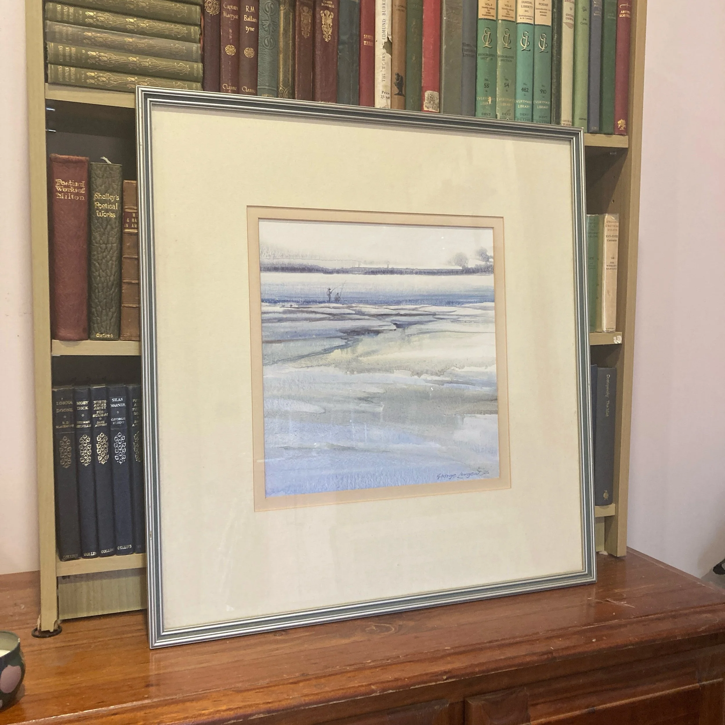 George Largent, After The Storm, watercolour, 57×54cm. Australian estuary scene with pastel blue and grey tones, framed with cream matting and light wood.