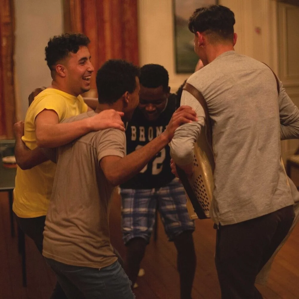 Members of our Young Leaders Council dance and play music at one of our residential courses.