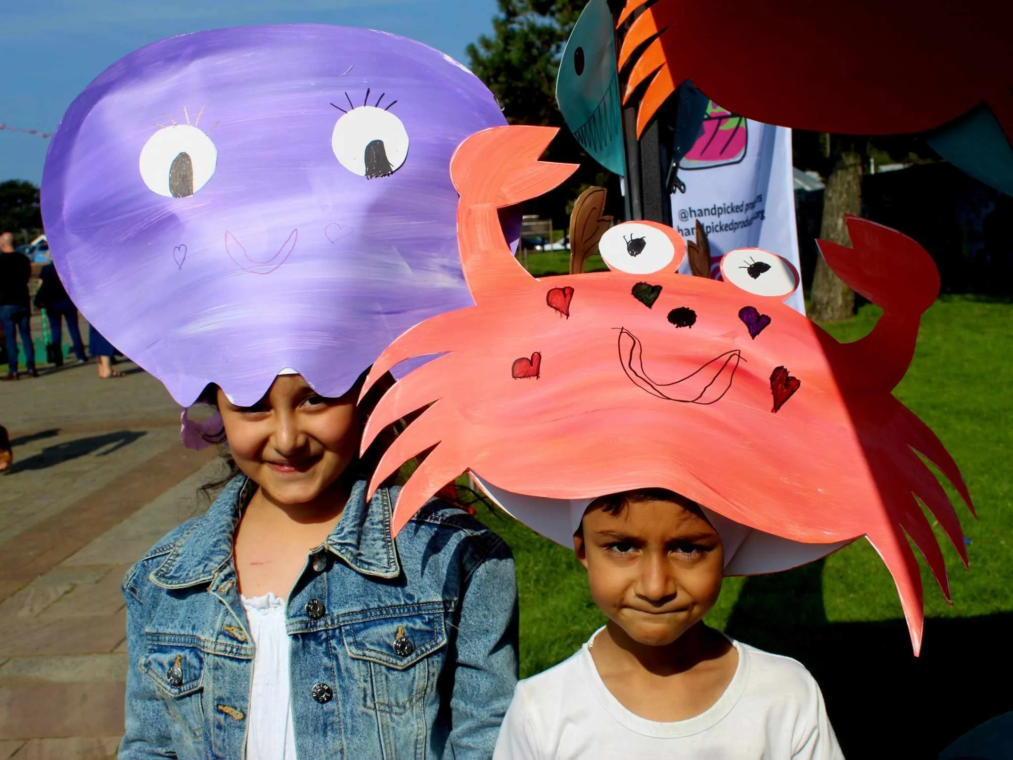 Community participants showing their creations at Harbour Fest