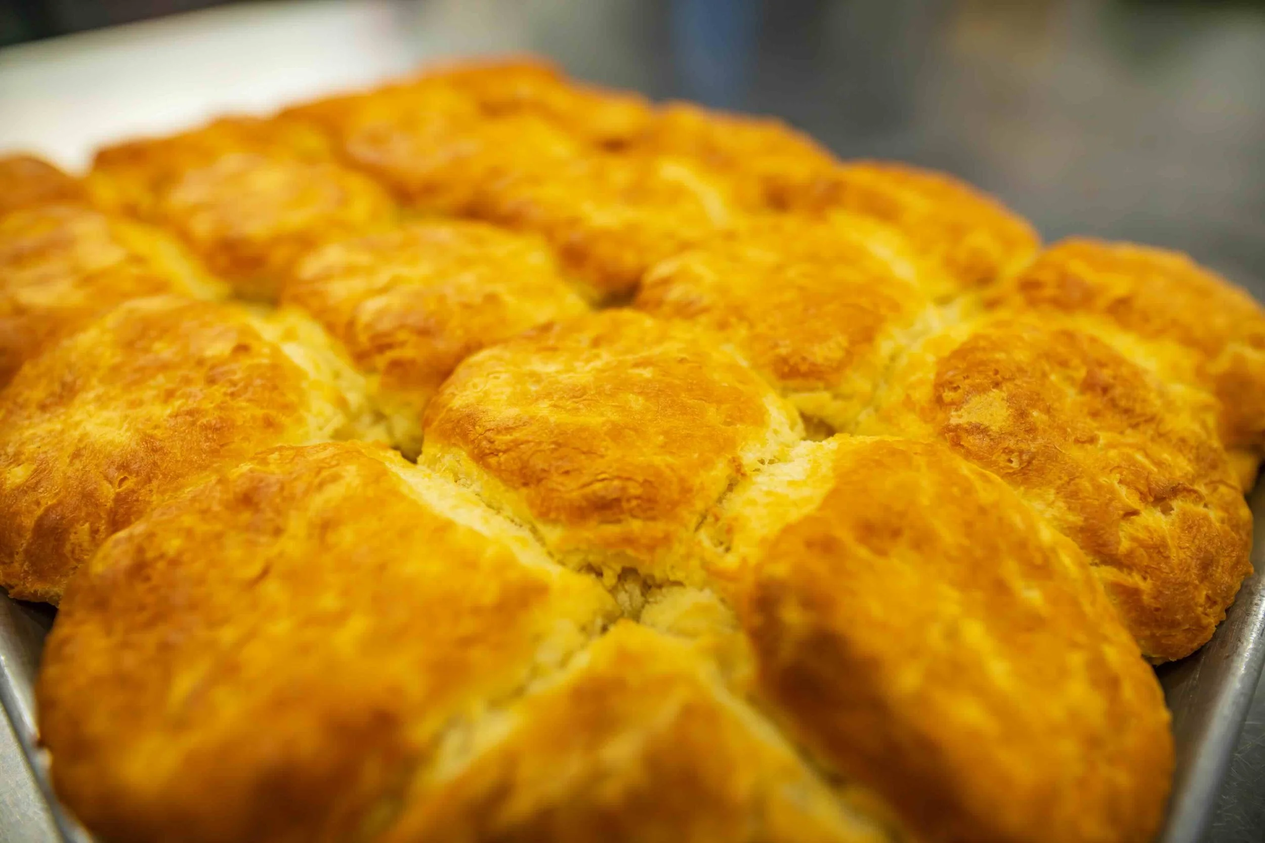 Fresh out of the oven homemade buttermilk biscuits. We use these for the Dirty South and Biscuit Benny options on our breakfast menu.