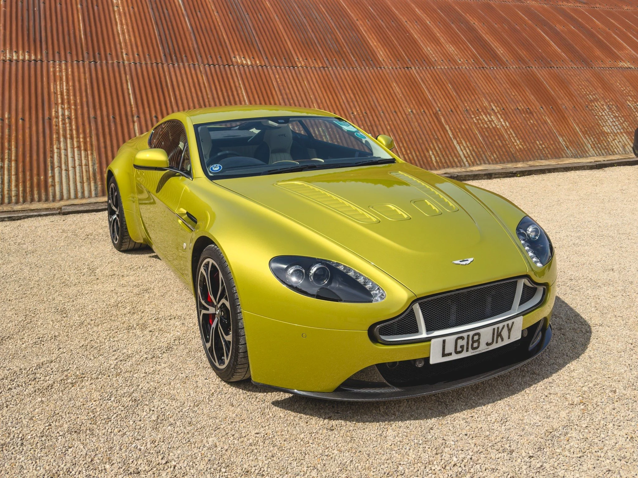 Glorious Aston Martin Cosmopolitan Yellow