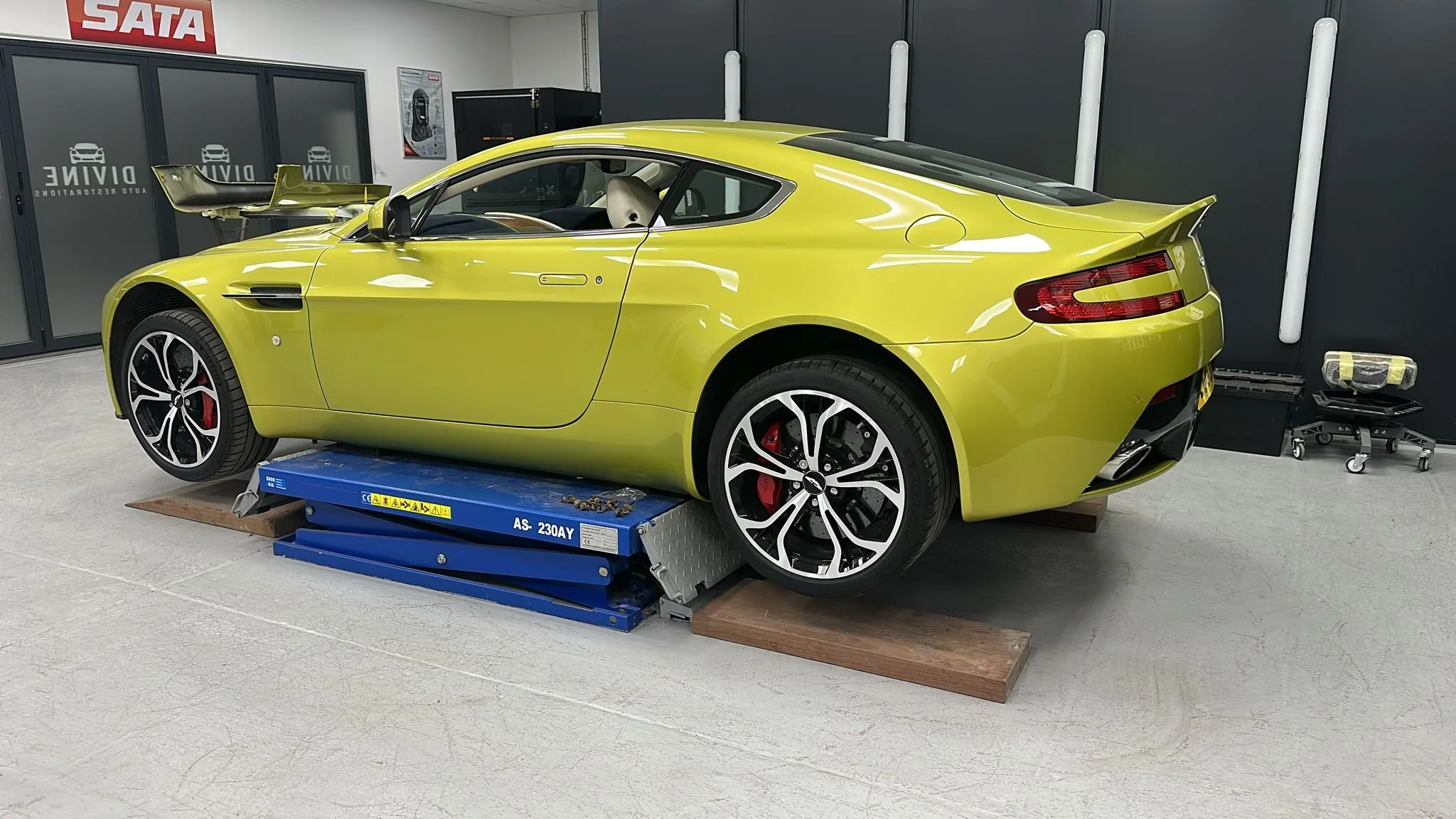 Switching to the 'Coke bottle skirts' Aston Martin Vantage
