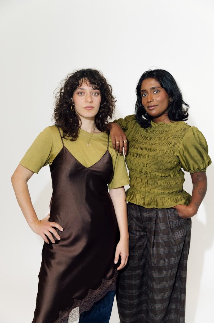two female mentees looking at the camera