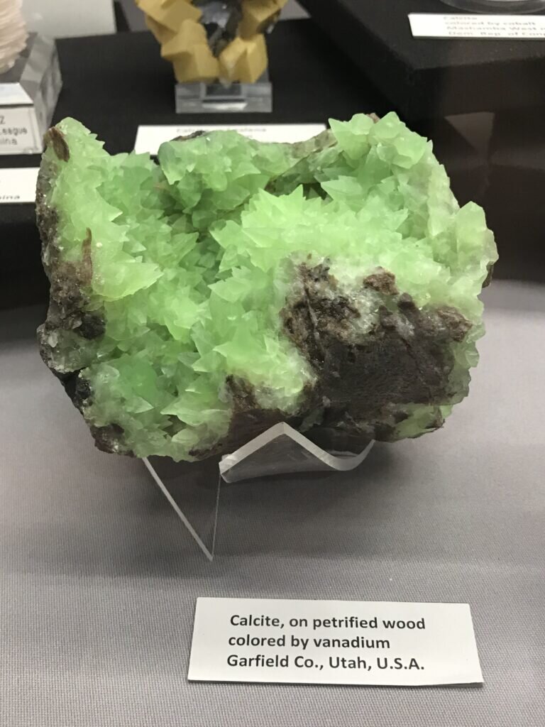 Kiwi Calcite from Utah – There was a feeding frenzy on these last year. This year they showed up in a few displays