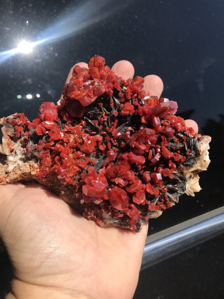 New material from Morocco…Vanadinite on Barite in the sunshine.