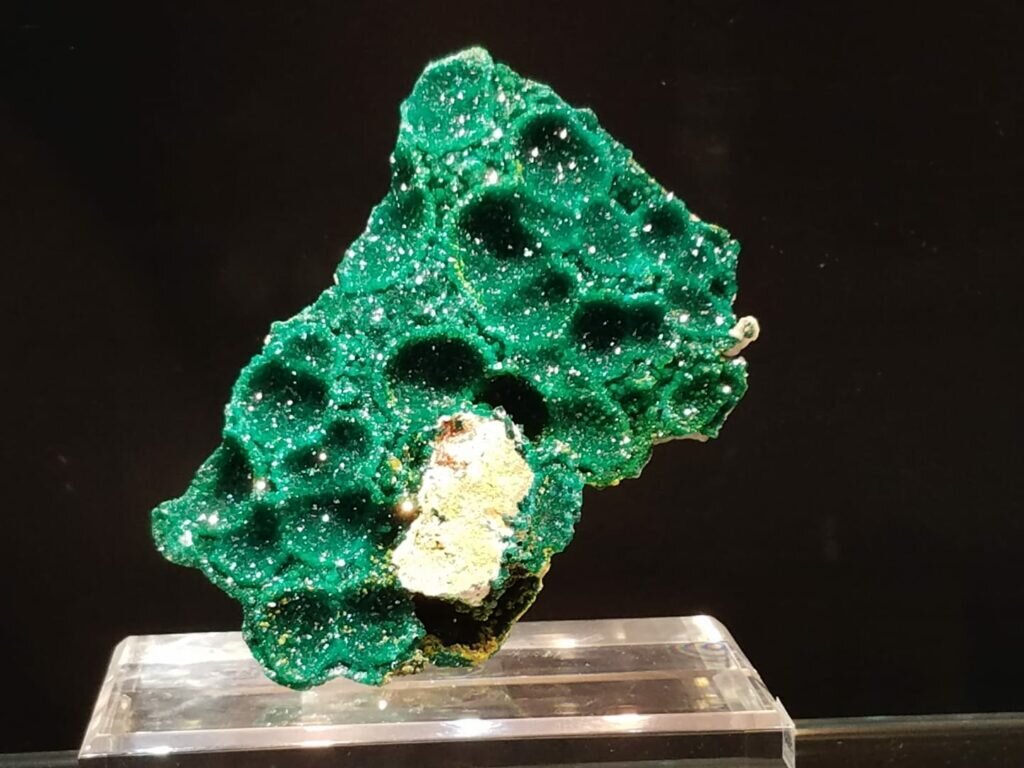 These were a new novelty for the show, Dioptase casts after a resorbed spherical mineral from Congo. Shiny and juicy!