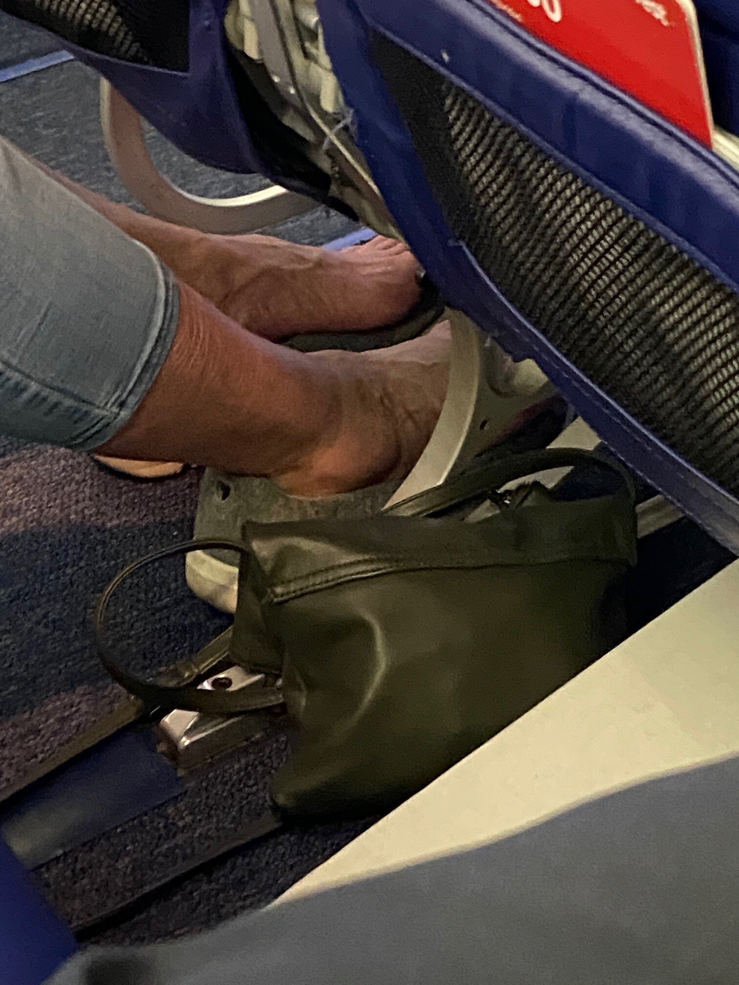 Airplane Etiquette....Please keep your shoes on 