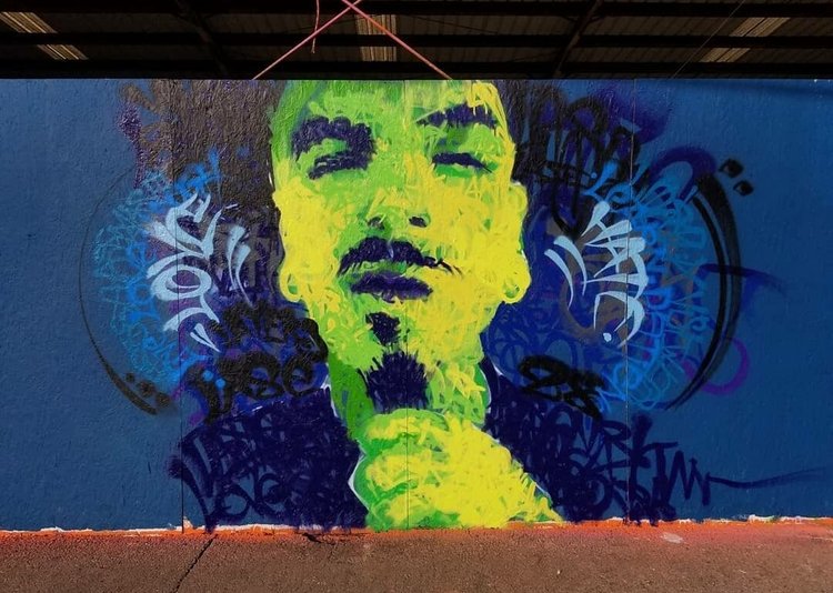Large-scale mural artwork for community revitalization by Lase 28