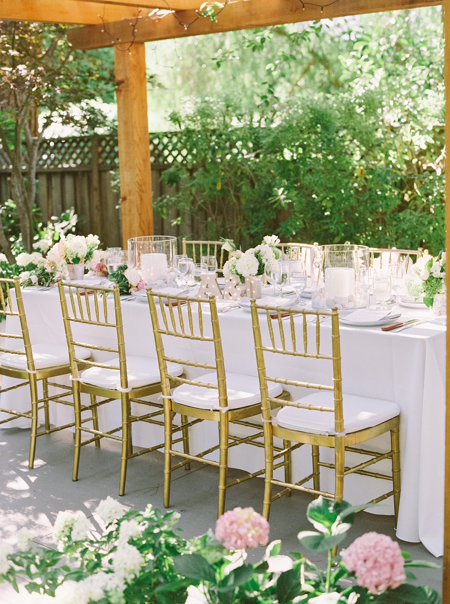 Gold chairs at wedding reception
