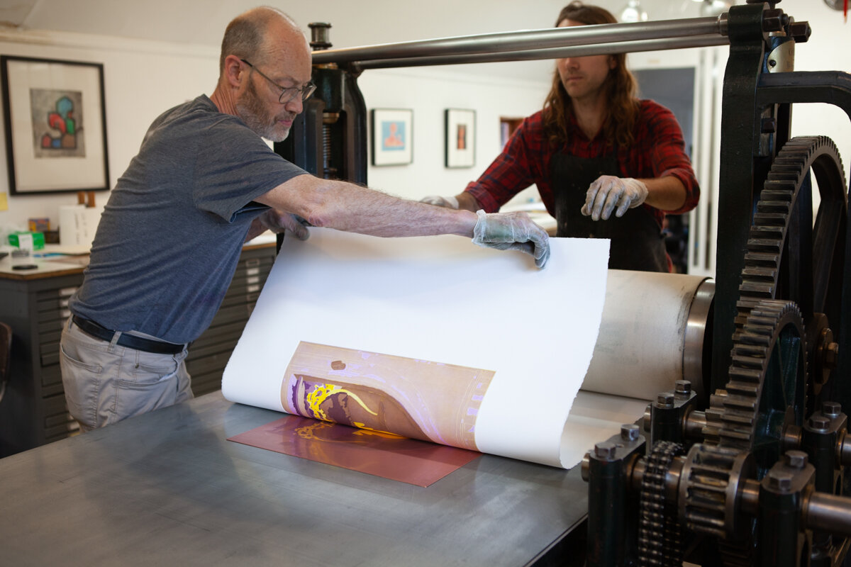 Peter and James pulling the print