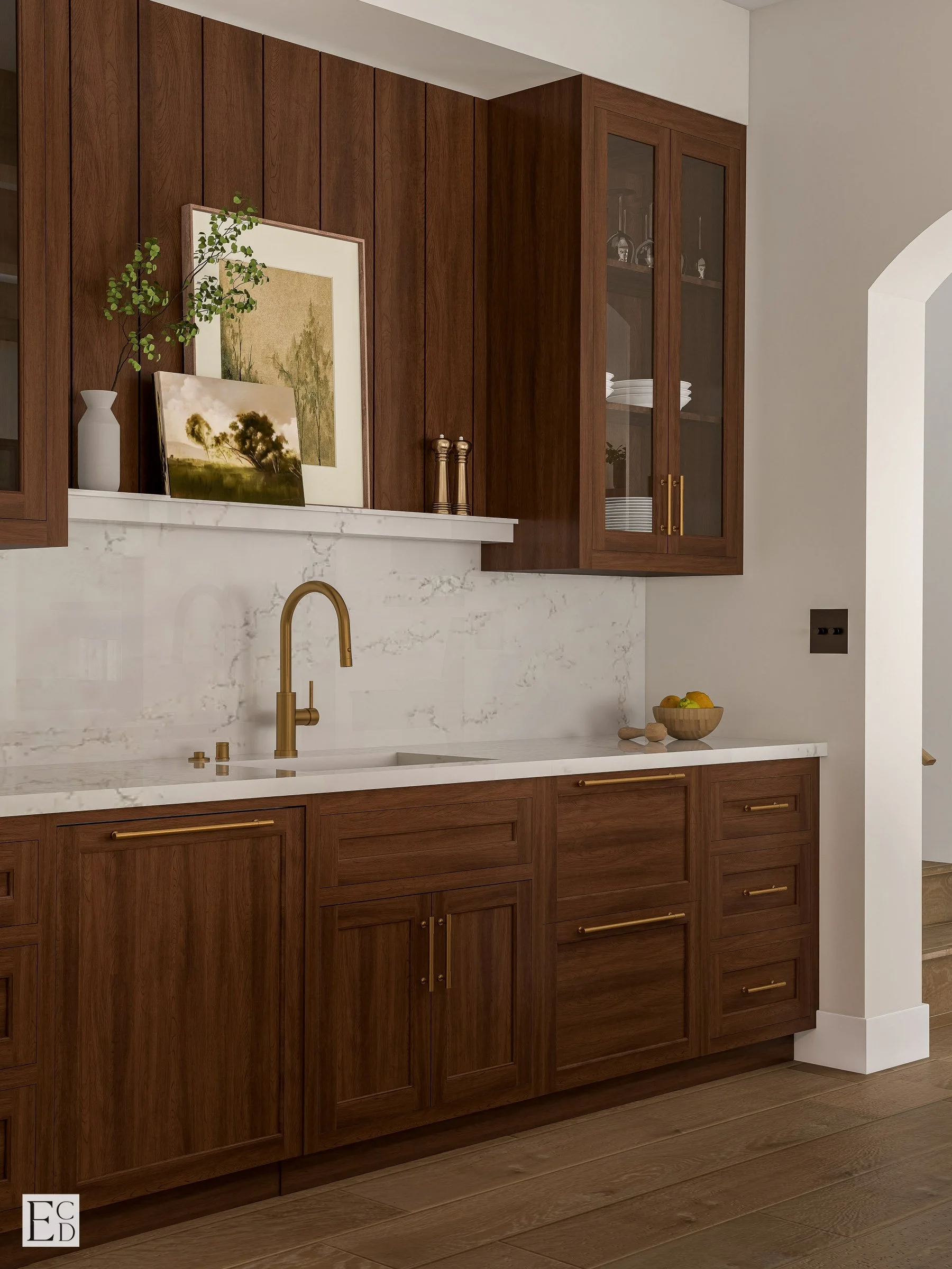Brass fittings against walnut and marble at the bar sink, glass-front uppers for stemware.