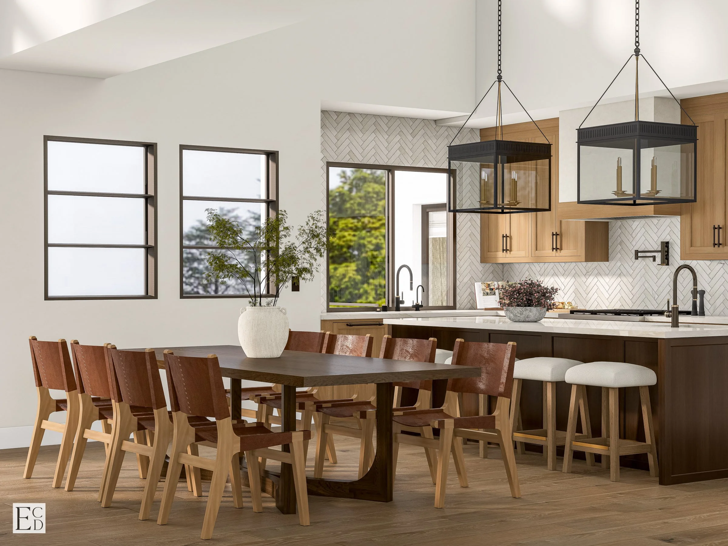 The table runs parallel to the island so the two zones read as one long working and gathering space.