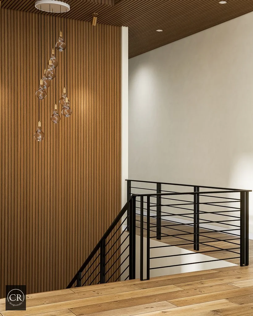 3D rendering of stairwell with full-height walnut slat wall and cascading globe pendant chandelier
