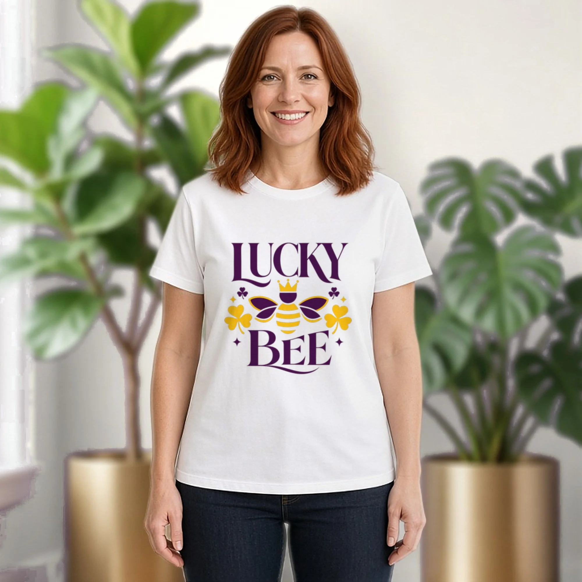 Lucky Bee tee in white, worn by a model in front of potted plants