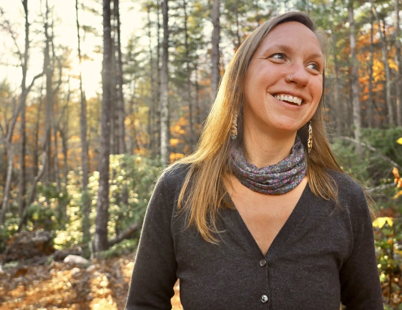 herbalist-Lindsey-Feldpausch-in-woods-with-sunlight.jpg