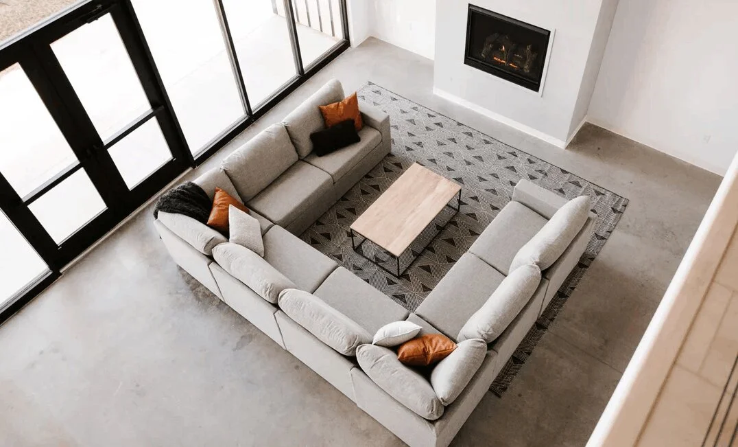 Modern hosting space with a cozy sectional.