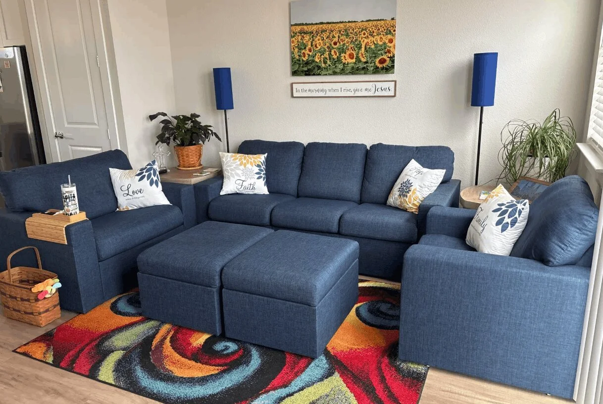 Cozy conversation zone with blue sofas.