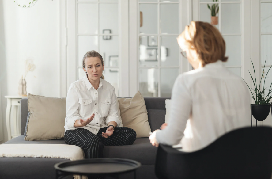 High-achieving professional in Los Angeles receiving EMDR therapy to process trauma with a licensed therapist.