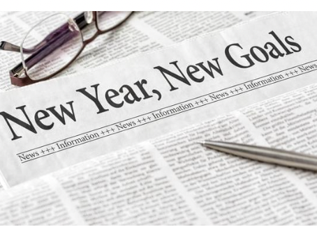 Newspaper with headline ‘New Year, New Goals’ representing personal growth, emotional well-being, and mental health