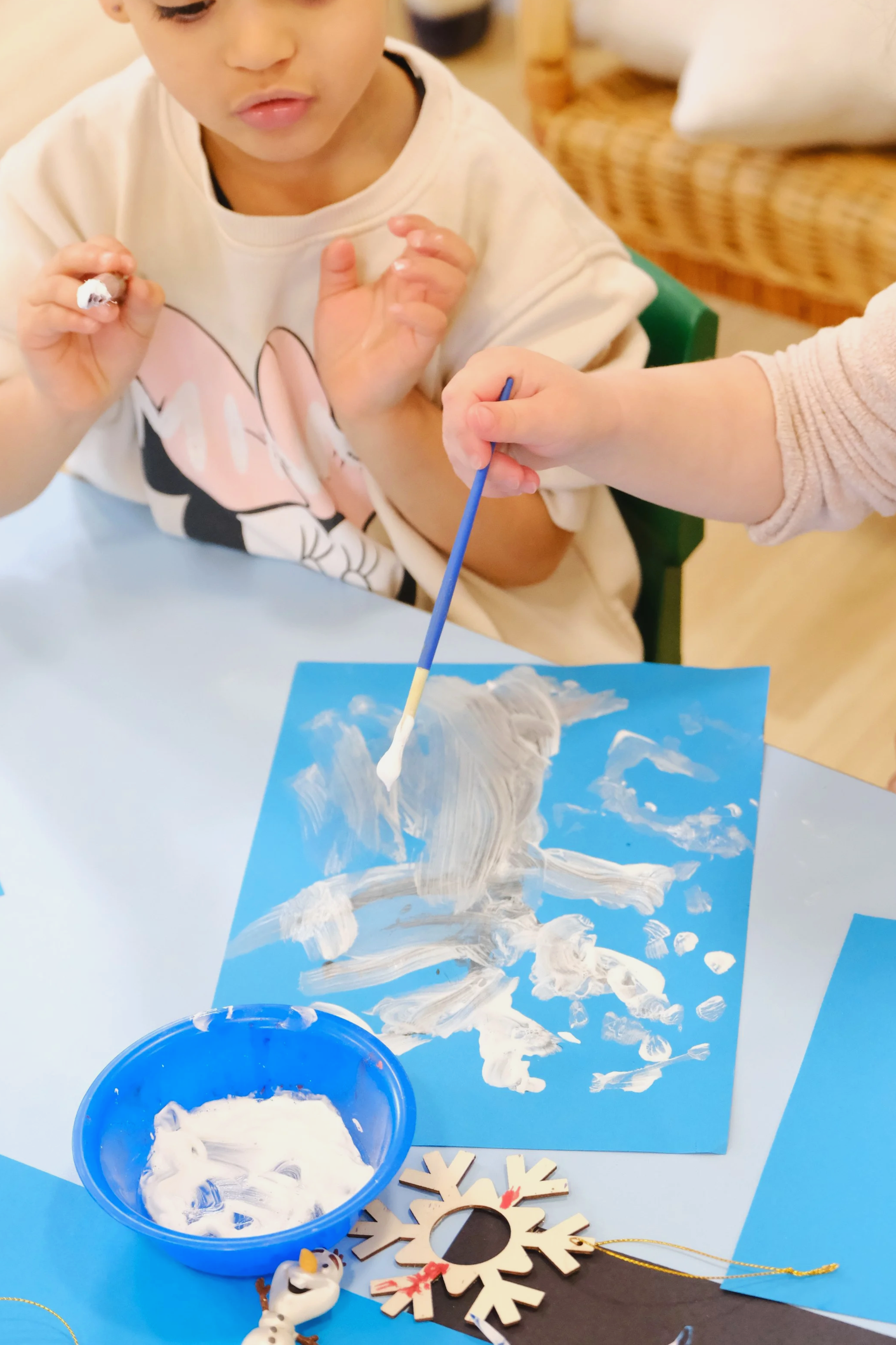 Children playing and painting