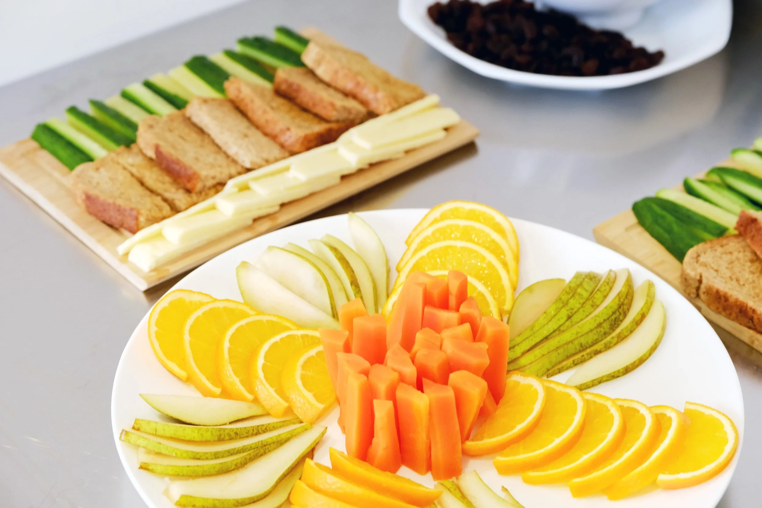 Freshly cut fruits on a plate
