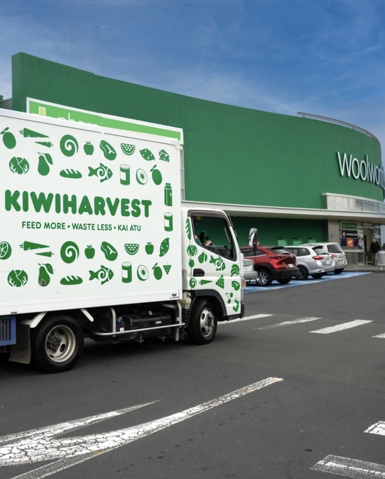KiwiHarvest food rescue truck parked outside of Woolworths supermarkets