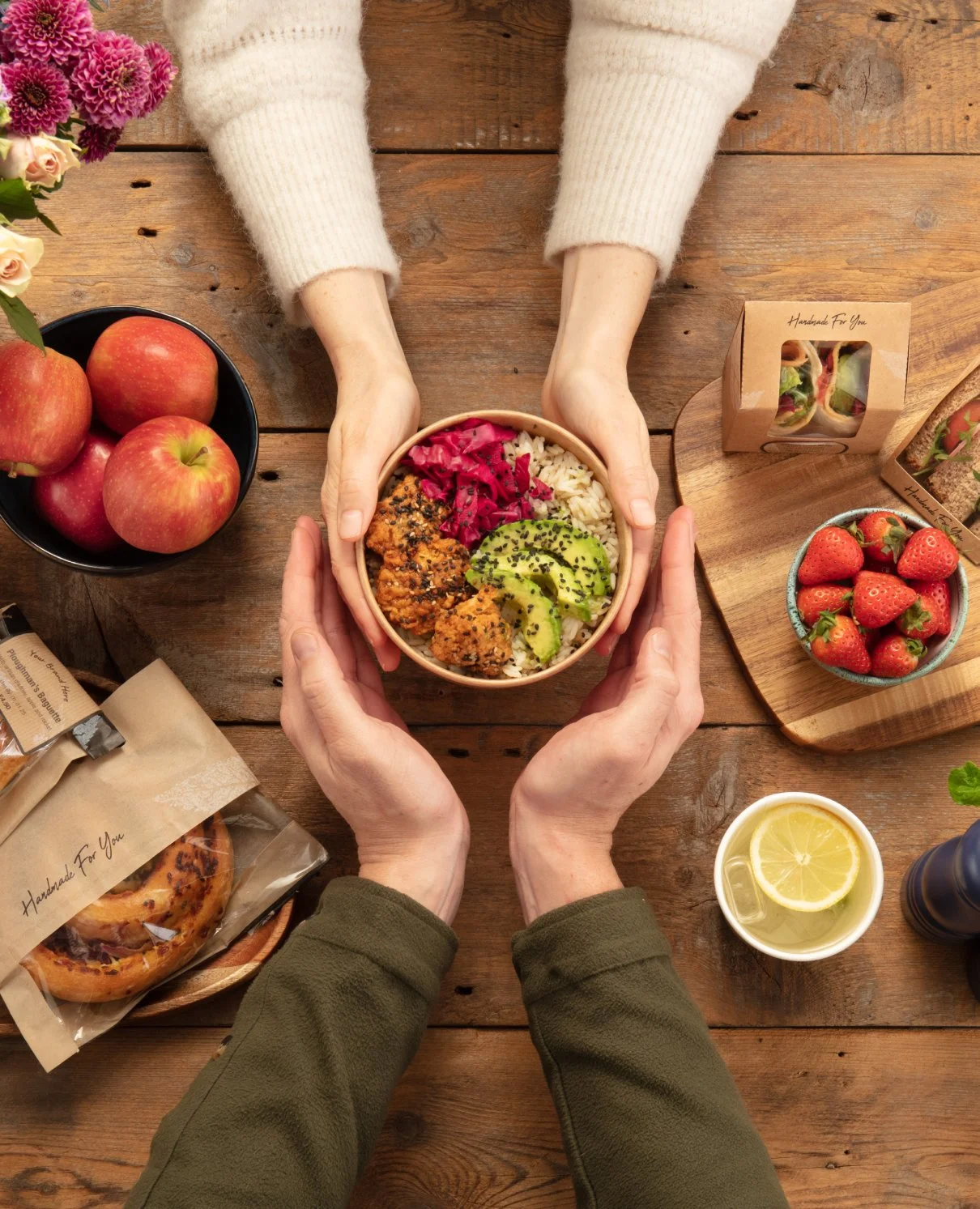 Compost packaging - hands around a food bowl