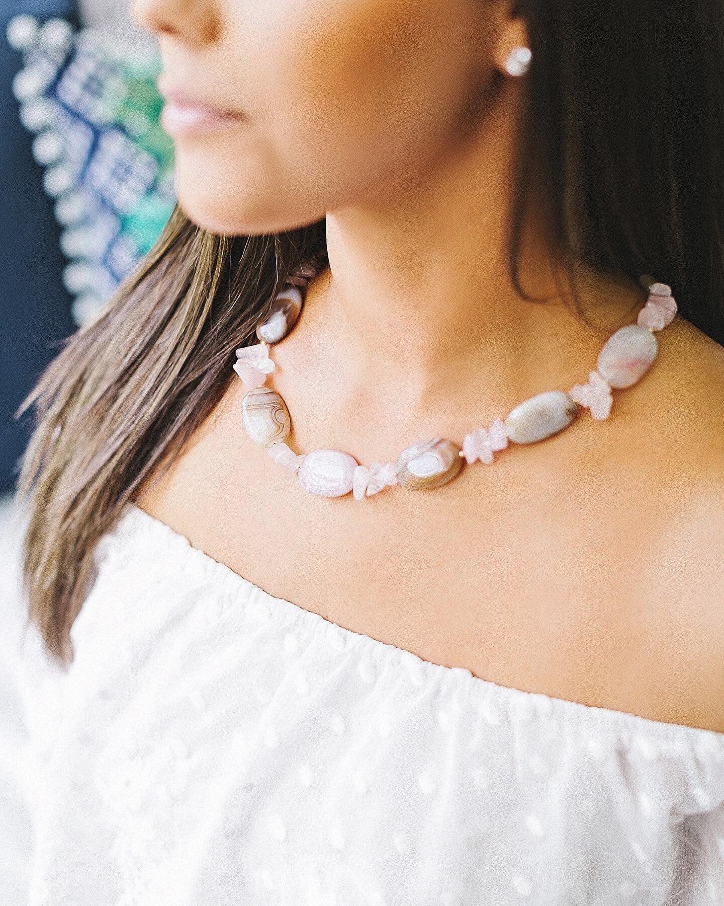 The &ldquo;Isn&rsquo;t She Lovely&rdquo; necklace is named for the high quality Rose Quartz stones used to fill the entire necklace. Itty bitty hematite sprinkles make an appearance for a sweet, sophisticated touch. This necklace is perfect for a bri