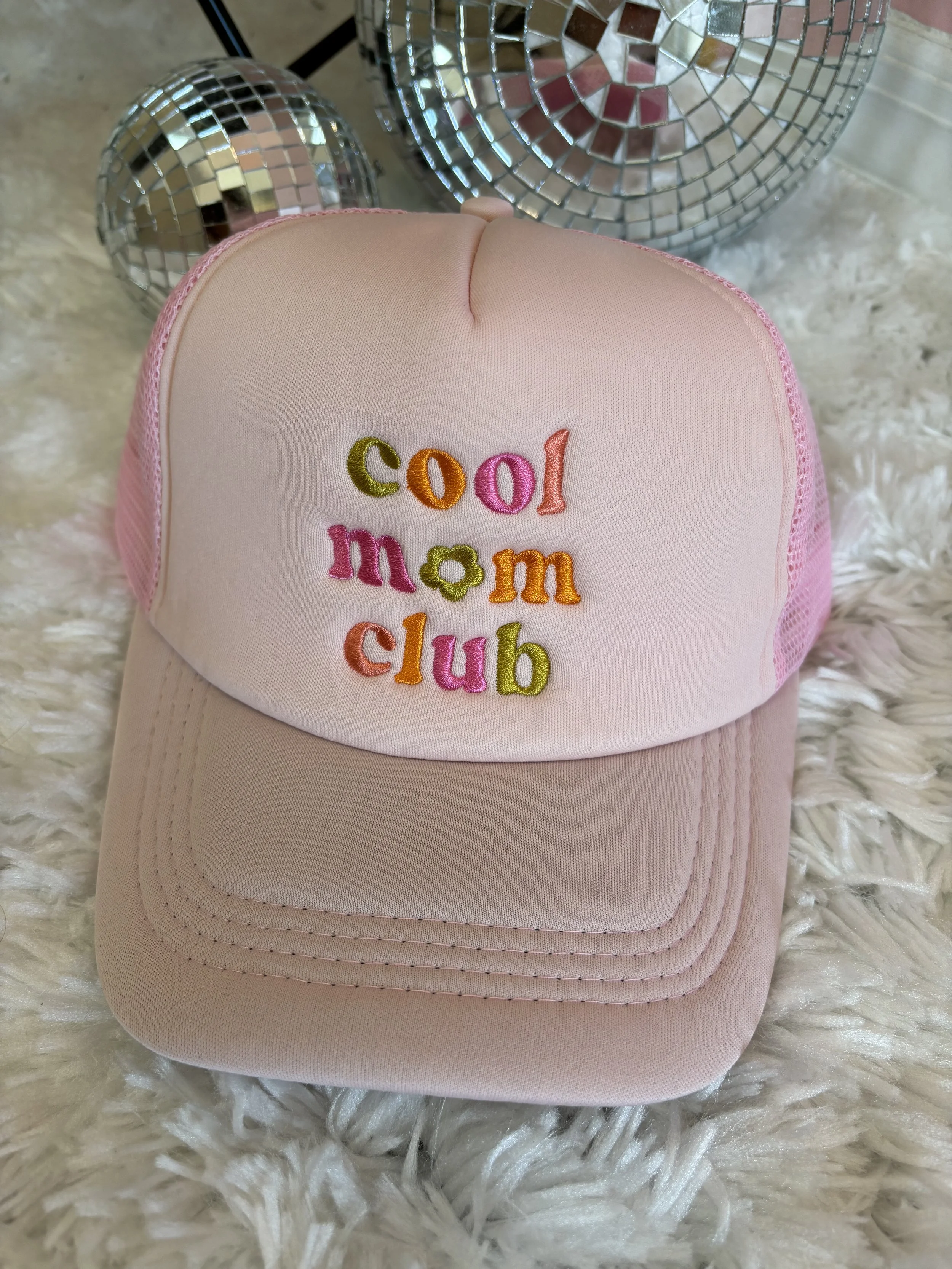 https://shoprootedandfree.co/collections/hats/products/cool-mom-club-trucker-hat