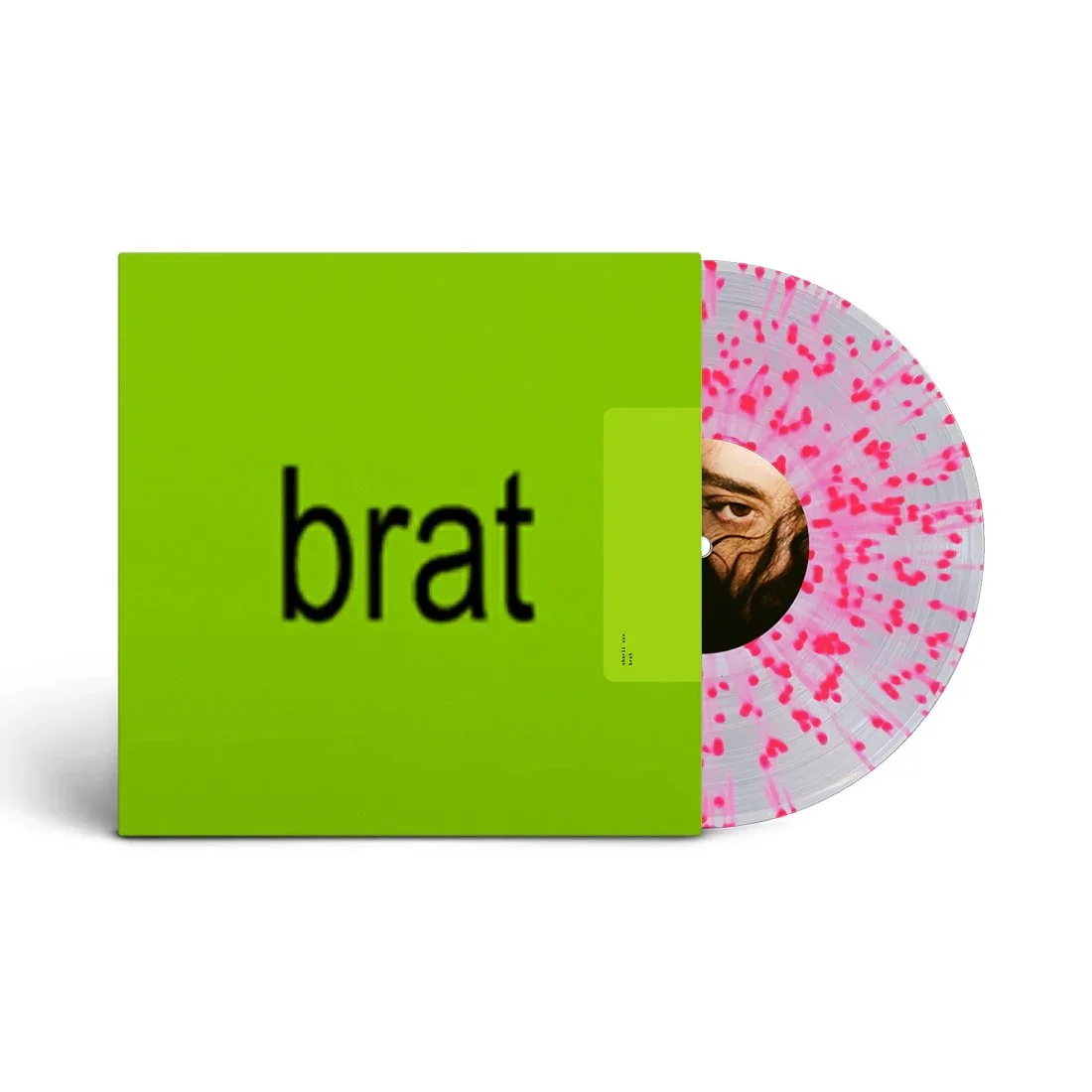 A CD with a pink splatter design partially inside a green box labeled 'brat' in black lowercase letters.