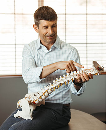 Dr C and spine shot.png