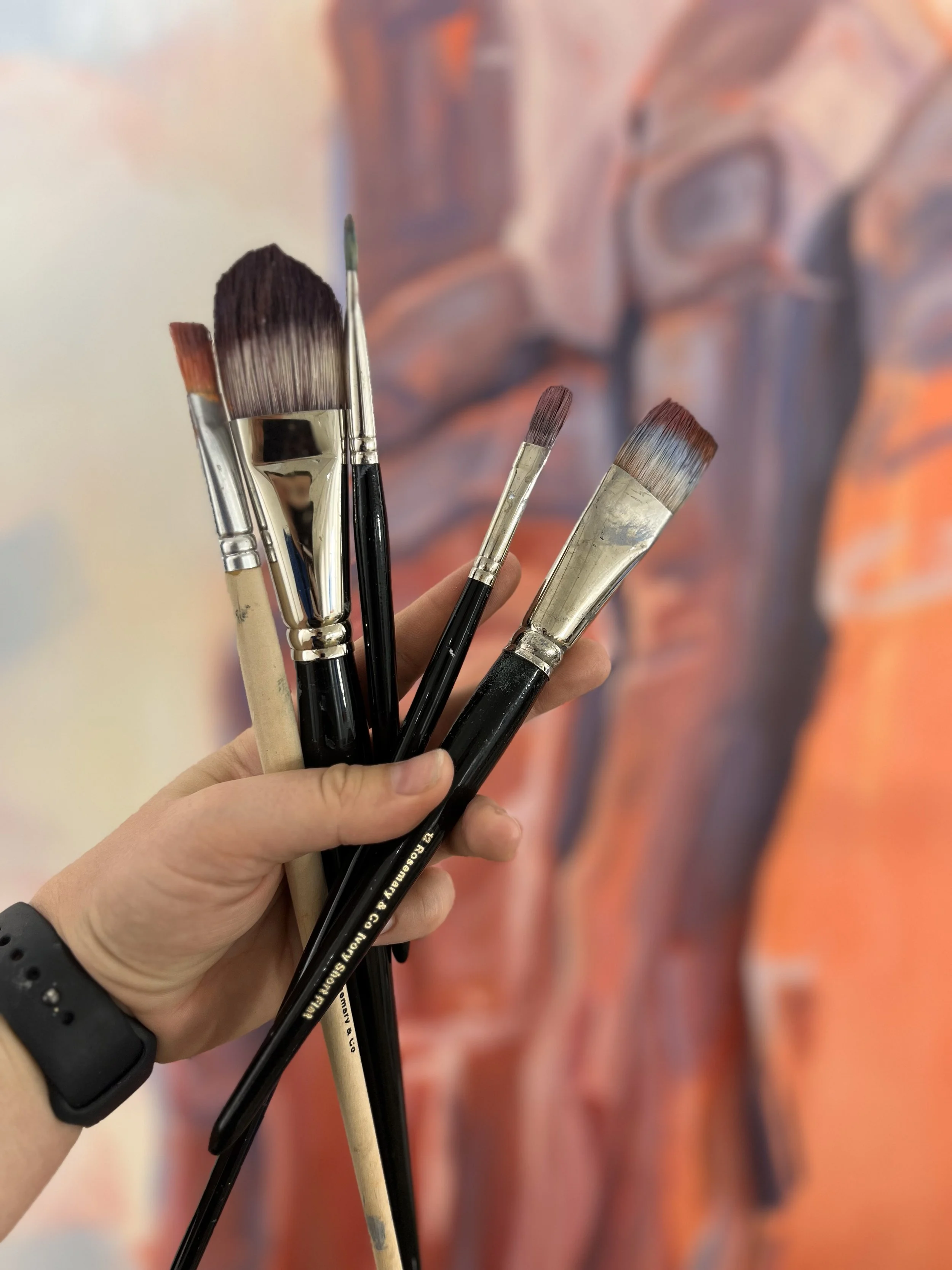 Kandice holding brushes.jpg
