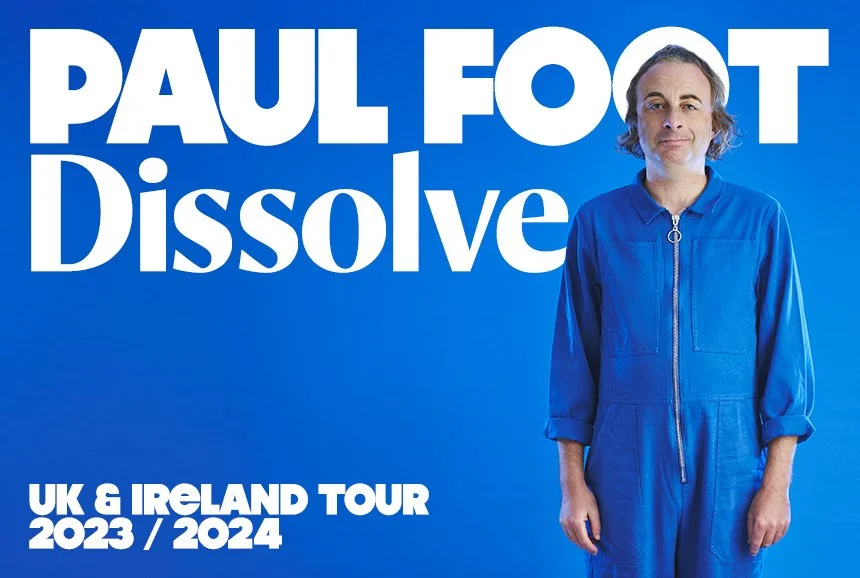 Promotional poster for Paul Foot's Dissolve UK & Ireland tour 2023/2024, featuring a man in a blue jumpsuit standing against a blue background with large white text