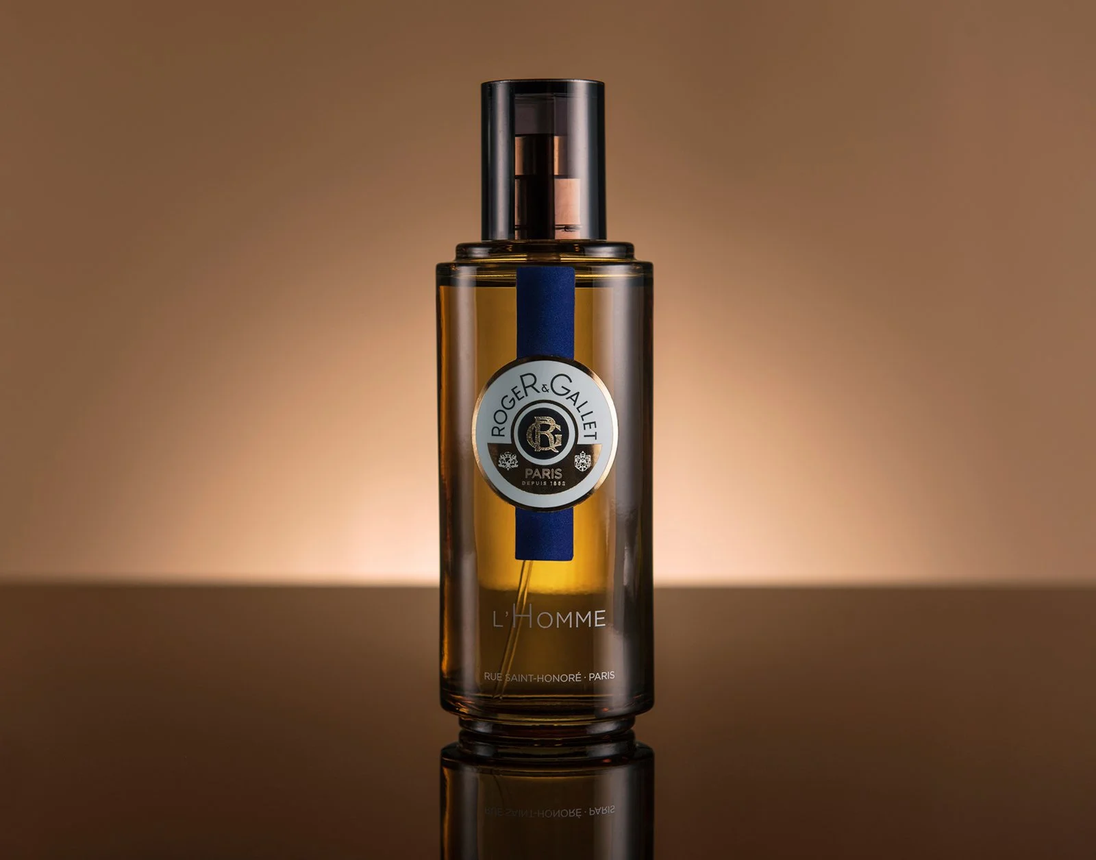 product hero photography shot showing roger and gallet aftershave on a graduated brown background
