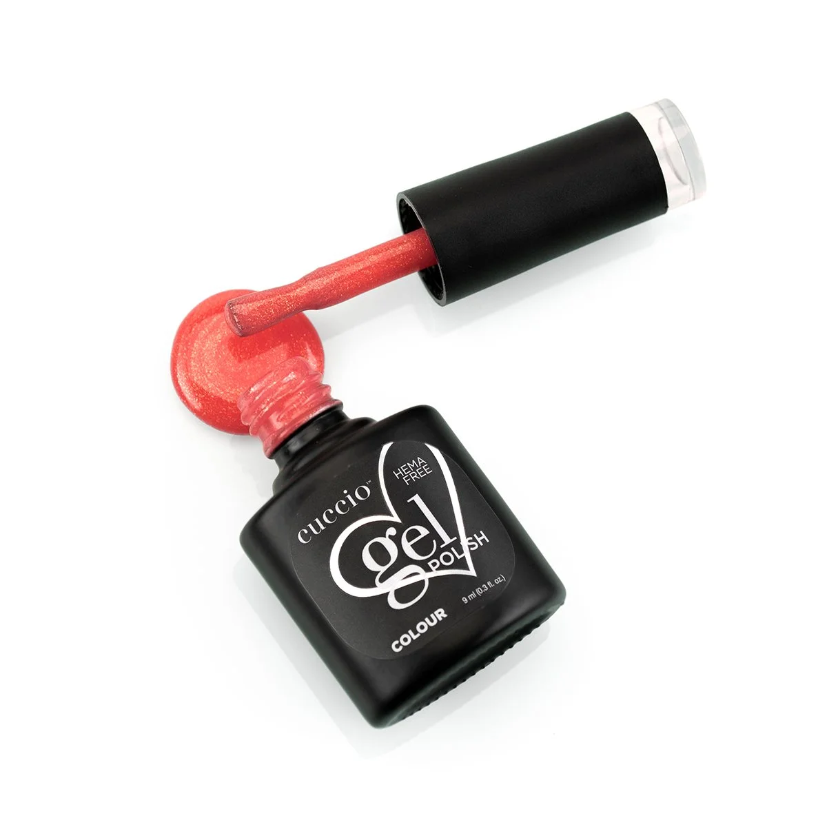 pack shot product photography showing a red bottle of cuccio nail gel spilling onto a white background