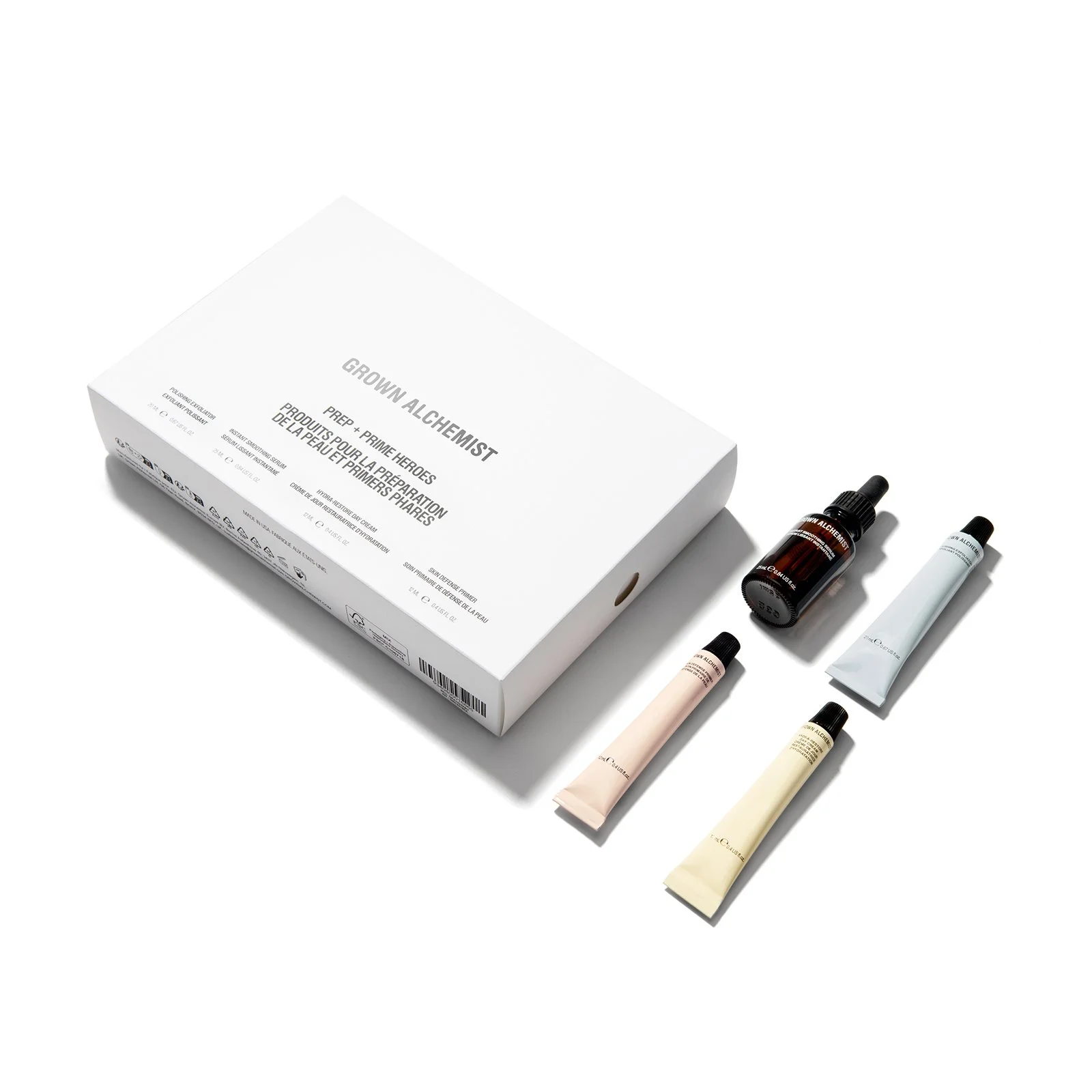 pack shot photography for grown alchemist  range of skincare cosmetic tubes with packaging on a white background
