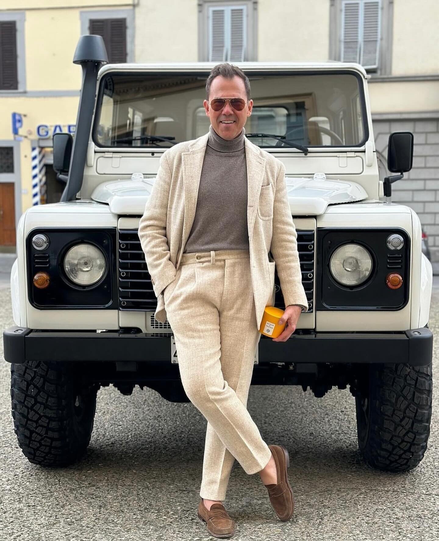 @wmbrownproject rolling @pittiuomo_official with a vintage cream #defender and the new red alligator @acquadiparma car diffuser.. what is not to love 🇺🇸 💛 🇮🇹