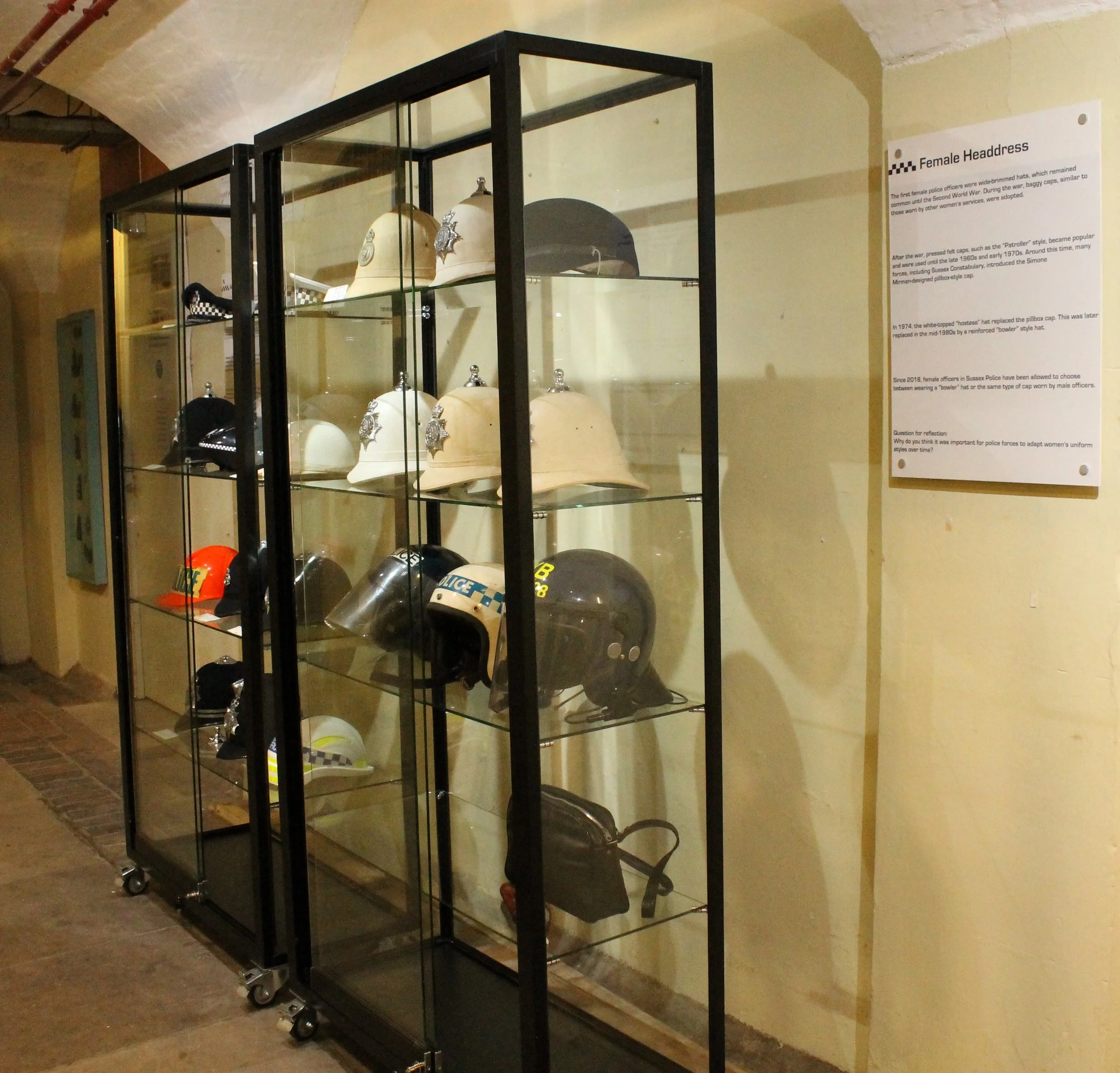 Various police hats and helmets 